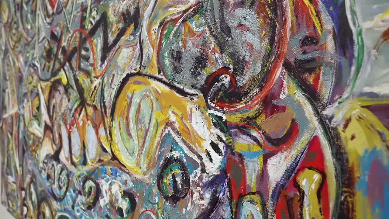 Close view of layered, colorful brushwork shown during The Met's Krasner and Pollock exhibition tour