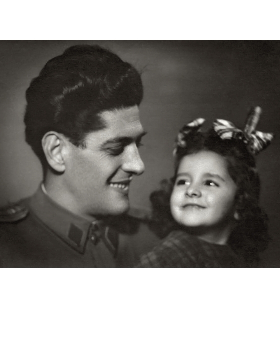 Black-and-white childhood photograph of Marina Abramović looking up at her smiling father