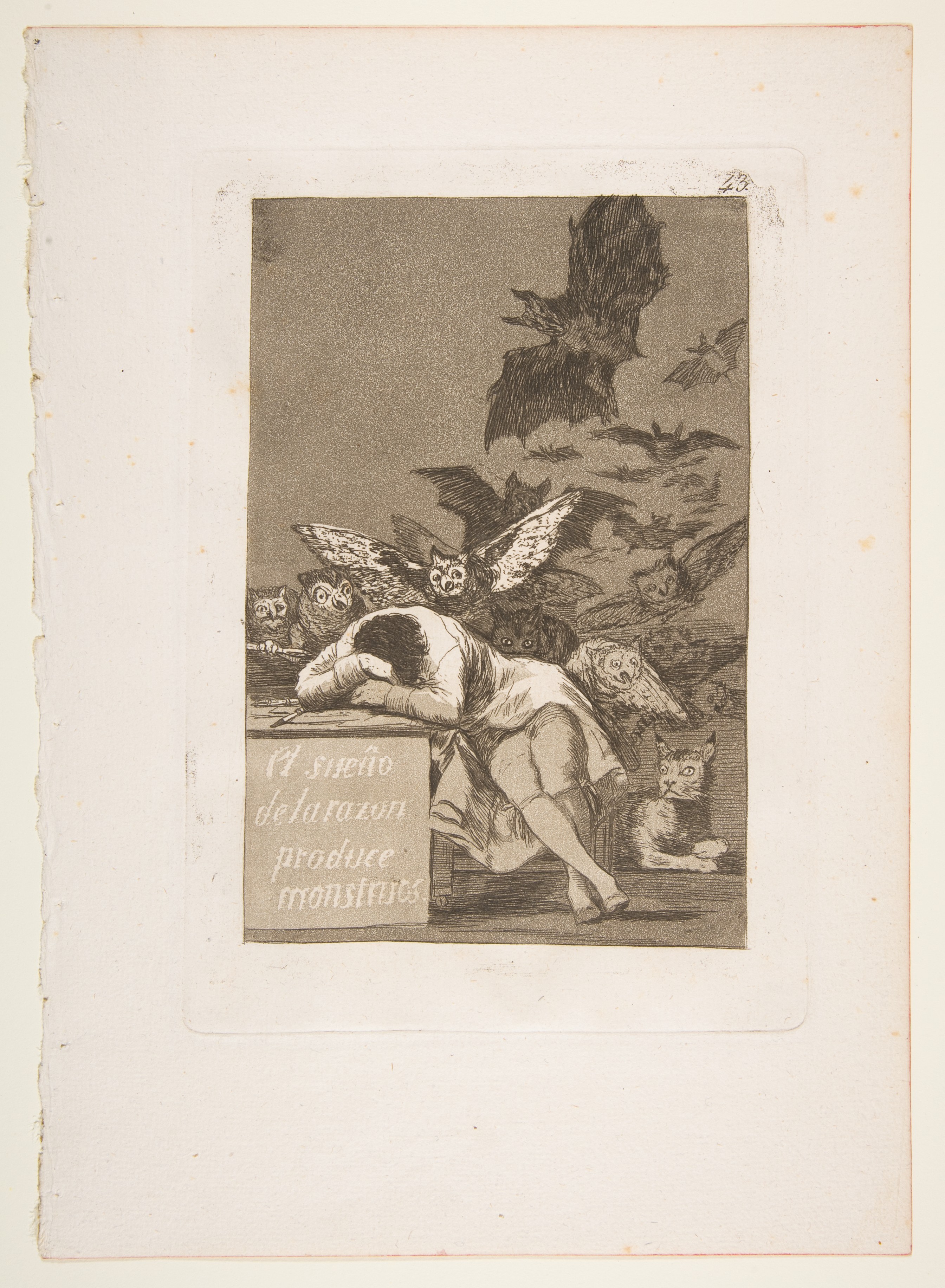 Full sheet of Goya’s print, with a sleeping man, bats and owls, pale margins and plate number 43.